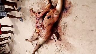 Classic:Man is disemboweled and decapitated