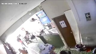 Hitman Executes Man in Cold Blood Inside Betting House (CCTV & Aftermath)