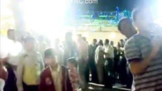 Classic: Idiotic dad gives his son a gun during a celebration