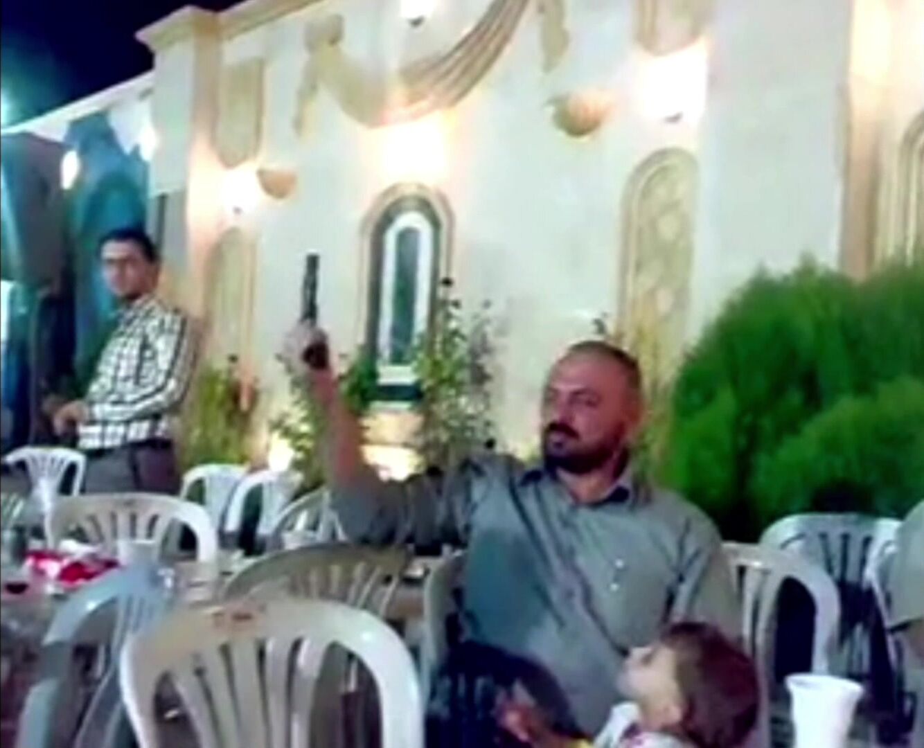 Classic: Idiotic dad gives his son a gun during a celebration