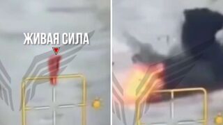 Retarded Ukrainian kicks an unexploded artillery shell.