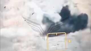 Retarded Ukrainian kicks an unexploded artillery shell.