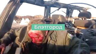 A Russian complains and shows the aftermath of a Ukrainian drone strike