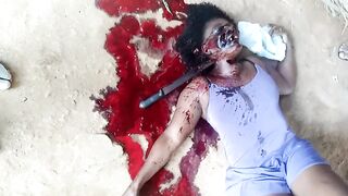 Murdered with a machete stuck in her neck