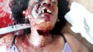Murdered with a machete stuck in her neck