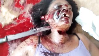 Murdered with a machete stuck in her neck