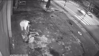 Elderly Lottery Ticket Vendor Sleeping On The Sidewalk Attacked With Rock And Robbed