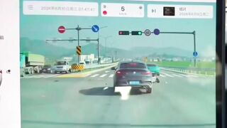 Idiot rides a motorcycle and runs a red light