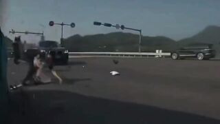 Idiot rides a motorcycle and runs a red light