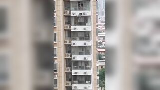 Woman Falls To Her Death In China