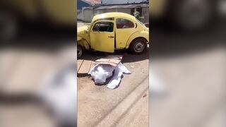Motorcyclist Crashes Into VW Beetle, Dies