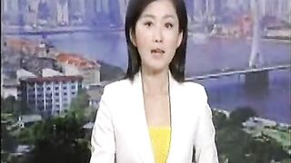 A Chinese TV news broadcast airs live footage of a woman falling from a tall building