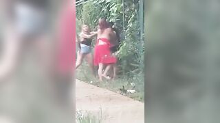 Women fighting in the street