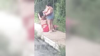 Women fighting in the street