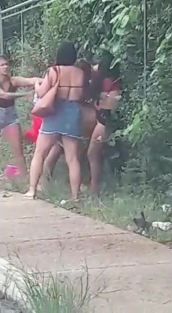 Women fighting in the street