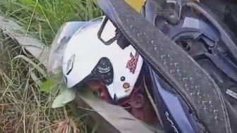 Motorcyclist Crushed Against Railing Following Collsion With A Truck In Indonesia