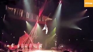 Classic: Performer loses grip during a show