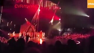 Classic: Performer loses grip during a show