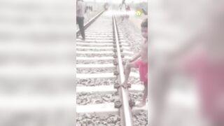 Man Lays On Tracks In Front Of Oncoming Train
