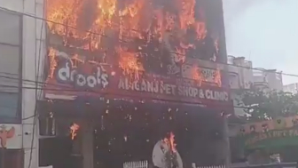 Man Jumps From Burning Building, Lands On Sharp Fencing