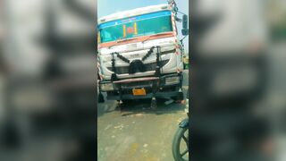 Old Man`s Head Flattened By The Truck Wheel