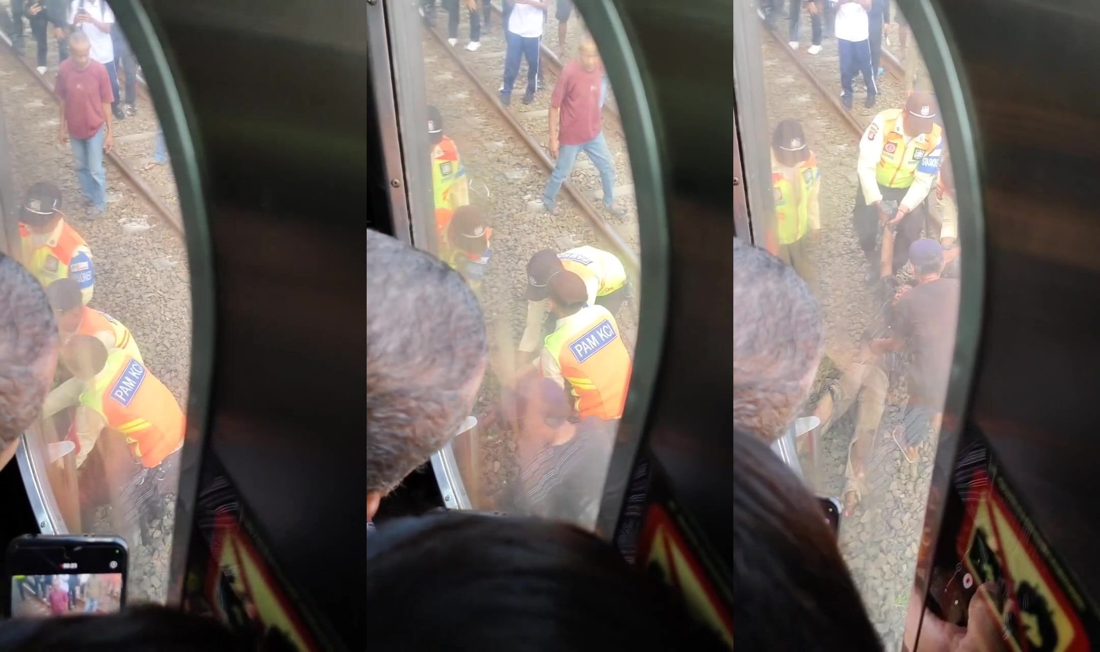 Man dragged out from under train