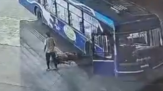 Bus Driver Gets Run Over By His Colleague