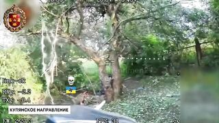 Brave Ukrainian carries his wounded friend.