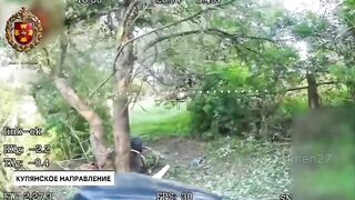 Brave Ukrainian carries his wounded friend.