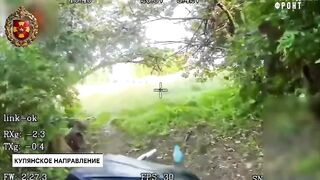 Brave Ukrainian carries his wounded friend.