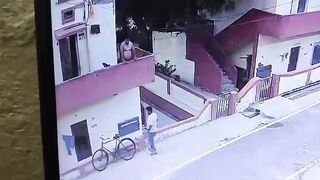 Man Falls From Balcony While Trying to Grab Ice Cream From Street Vendor