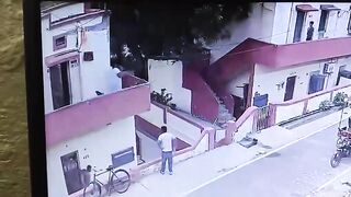 Man Falls From Balcony While Trying to Grab Ice Cream From Street Vendor