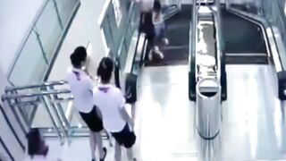 Classic: Woman gets crushed by Escalator Saving her son