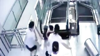 Classic: Woman gets crushed by Escalator Saving her son