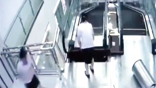 Classic: Woman gets crushed by Escalator Saving her son