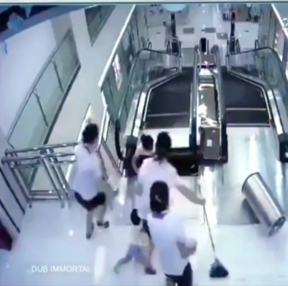 Classic: Woman gets crushed by Escalator Saving her son