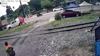 Motorcyclist Gets Destroyed By Speeding Train In Thailand