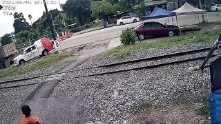 Motorcyclist Gets Destroyed By Speeding Train In Thailand