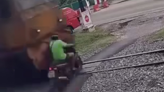 Motorcyclist Gets Destroyed By Speeding Train In Thailand