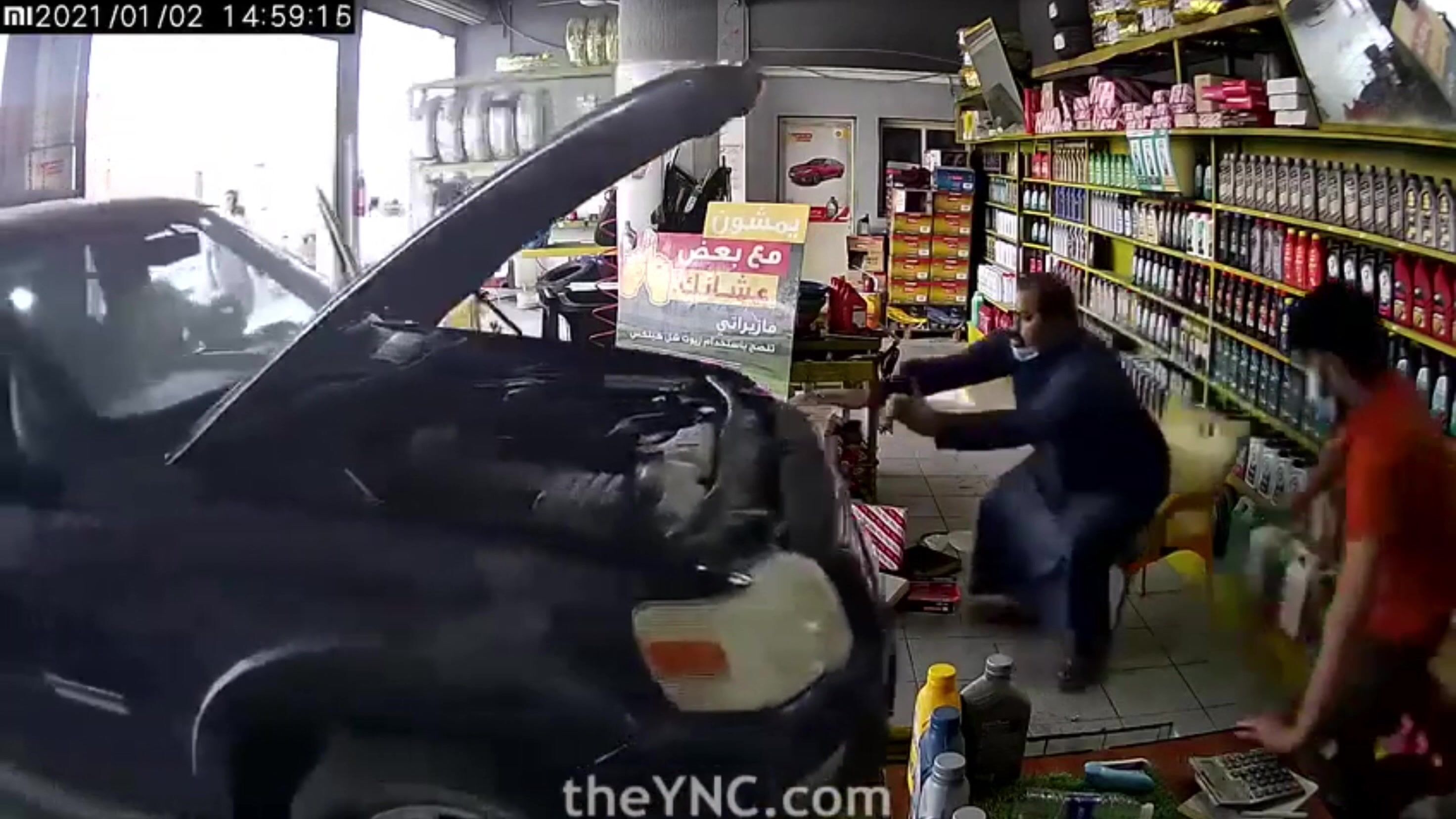 Classic: Worker gets crushed by car during oil exchange
