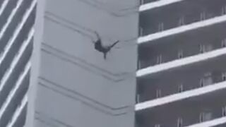 Person Jumps From A Tall Residental Building In  in Makati, Philippines
