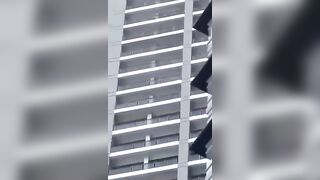 Person Jumps From A Tall Residental Building In  in Makati, Philippines
