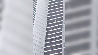 Person Jumps From A Tall Residental Building In  in Makati, Philippines