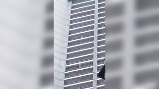 Person Jumps From A Tall Residental Building In  in Makati, Philippines