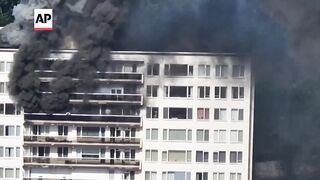 Man seen climbing from balcony during Antwerp fire