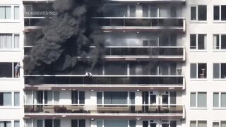 Man seen climbing from balcony during Antwerp fire