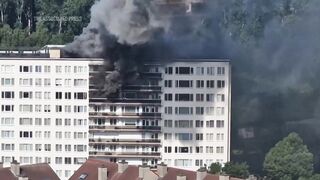 Man seen climbing from balcony during Antwerp fire