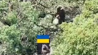 Russian shoots Ukrainian in the neck.