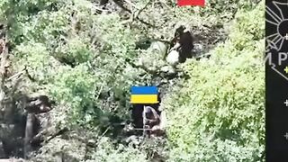 Russian shoots Ukrainian in the neck.