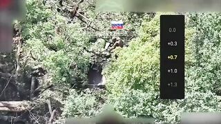 Russian shoots Ukrainian in the neck.
